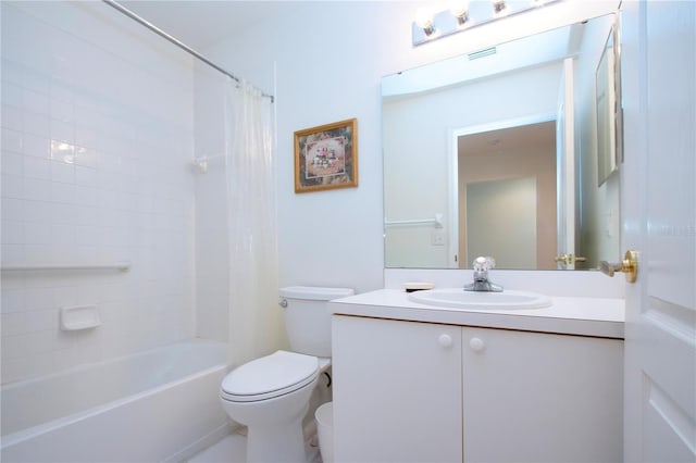 full bathroom featuring vanity, shower / bath combo with shower curtain, and toilet