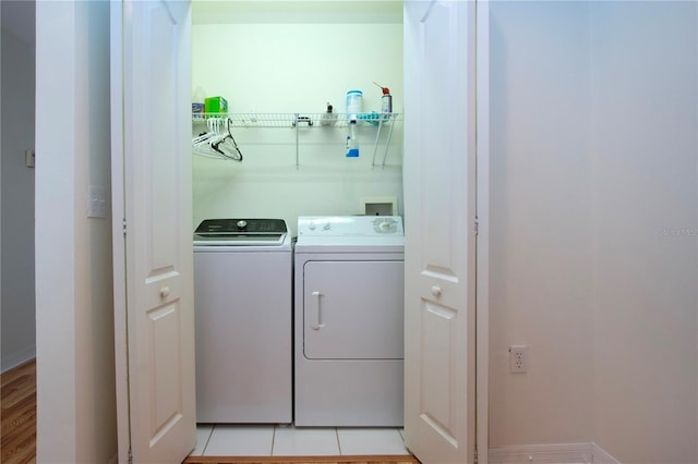 laundry room with independent washer and dryer