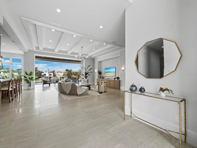 living room featuring a chandelier, recessed lighting, and beam ceiling