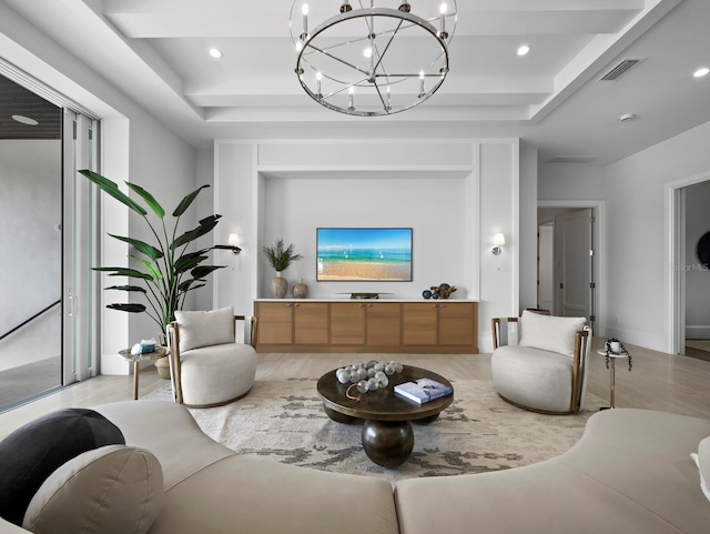 living area with a chandelier, light wood finished floors, and recessed lighting