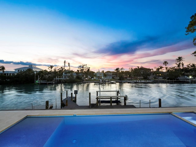 dock area with a water view