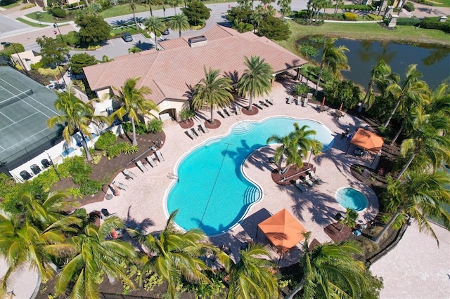 birds eye view of property featuring a water view