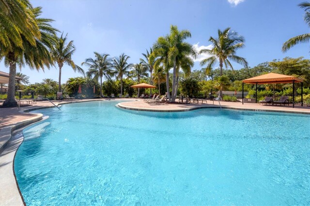 view of swimming pool with a gazebo