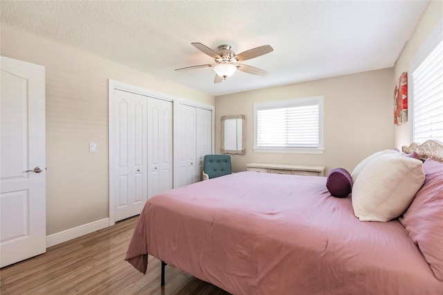 bedroom featuring ceiling fan and hardwood / wood-style floors