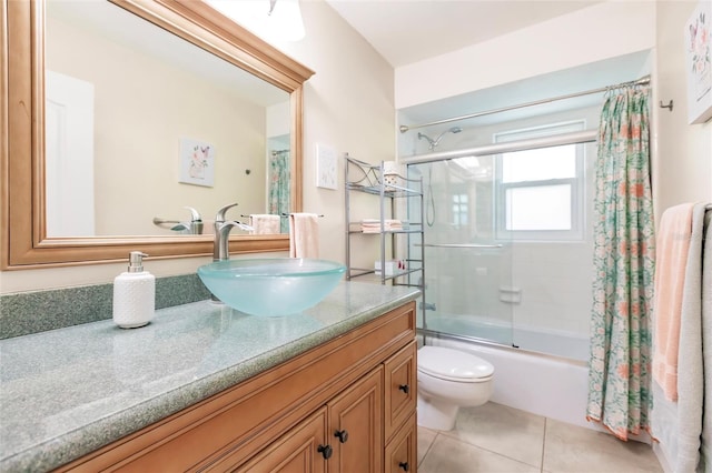 full bathroom with tile flooring, shower / bath combination with curtain, oversized vanity, and toilet