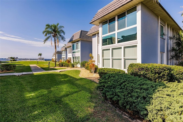 exterior space featuring a lawn