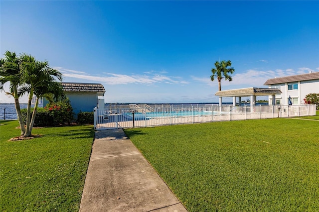 exterior space with a pergola and a community pool