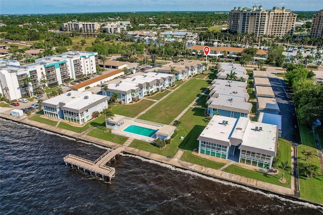 birds eye view of property featuring a water view