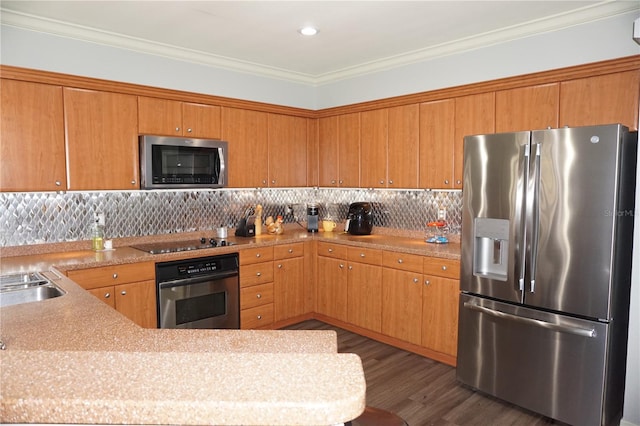 kitchen with appliances with stainless steel finishes, tasteful backsplash, ornamental molding, and dark wood-type flooring