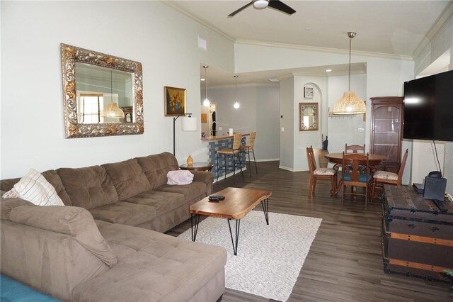 living room with dark hardwood / wood-style flooring, high vaulted ceiling, ceiling fan, and crown molding