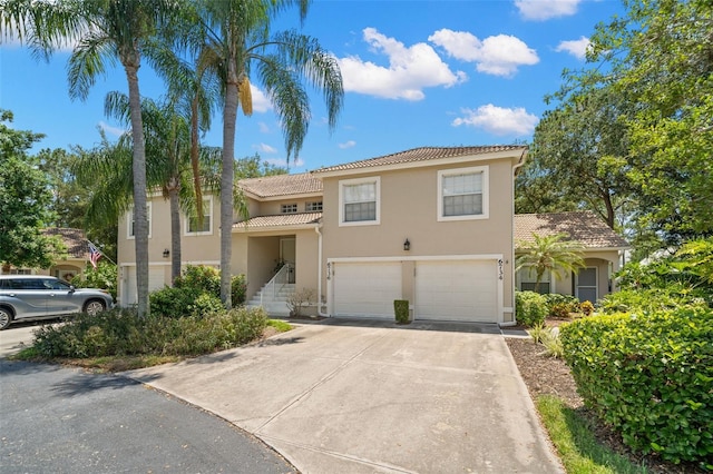 mediterranean / spanish-style house featuring a garage