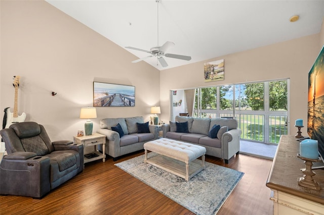 living room with ceiling fan, dark wood-type flooring, and high vaulted ceiling