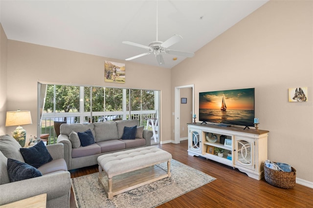 living room featuring ceiling fan, dark hardwood / wood-style floors, and high vaulted ceiling