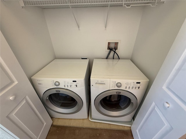 laundry room with laundry area and washing machine and dryer