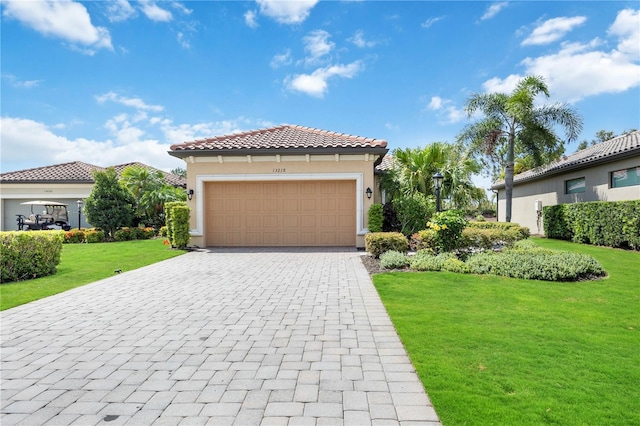 mediterranean / spanish-style home featuring a front lawn