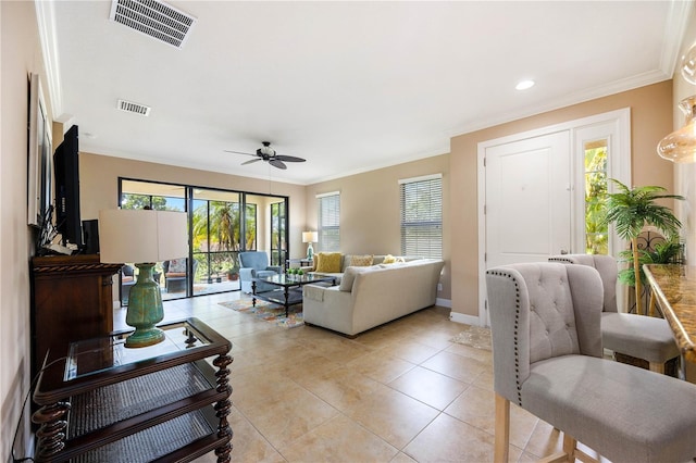 living room featuring light tile patterned floors, ceiling fan, and ornamental molding