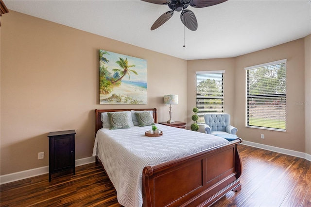 bedroom featuring ceiling fan and dark wood-type flooring