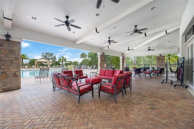 view of patio / terrace featuring an outdoor living space and a community pool