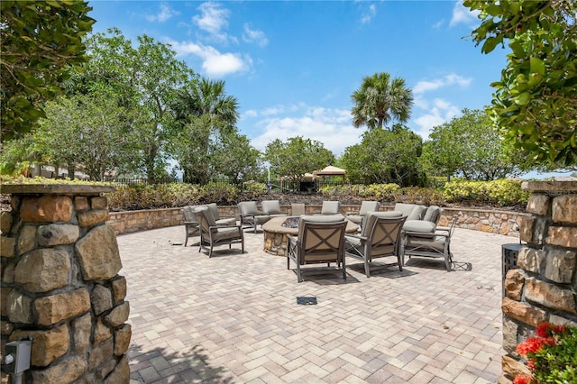 view of patio / terrace featuring a fire pit