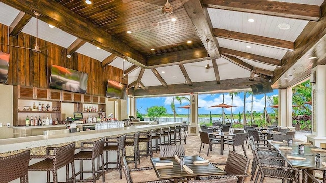 view of patio featuring a gazebo and exterior bar