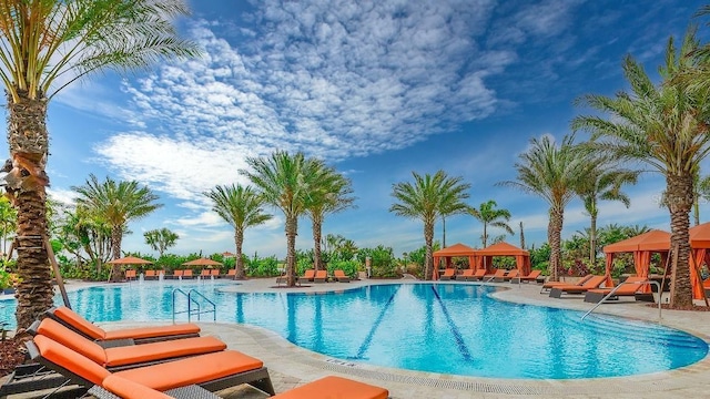 view of swimming pool featuring a gazebo and a patio area