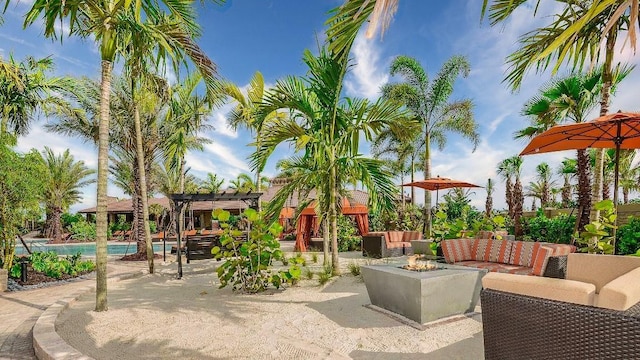 view of patio / terrace with a pergola and an outdoor hangout area