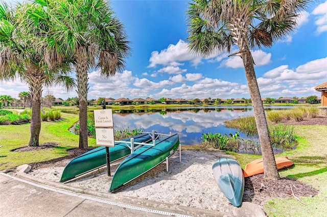 view of play area with a water view