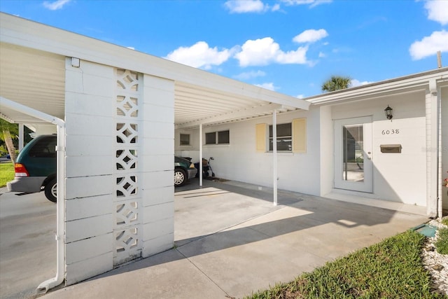 view of patio featuring a carport