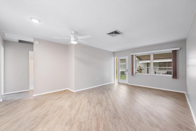 unfurnished room with light hardwood / wood-style floors and ceiling fan