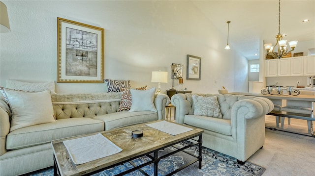 carpeted living room featuring vaulted ceiling and an inviting chandelier