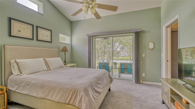 carpeted bedroom with vaulted ceiling, ceiling fan, and access to outside