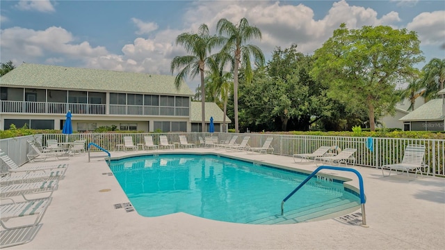 view of swimming pool featuring a patio