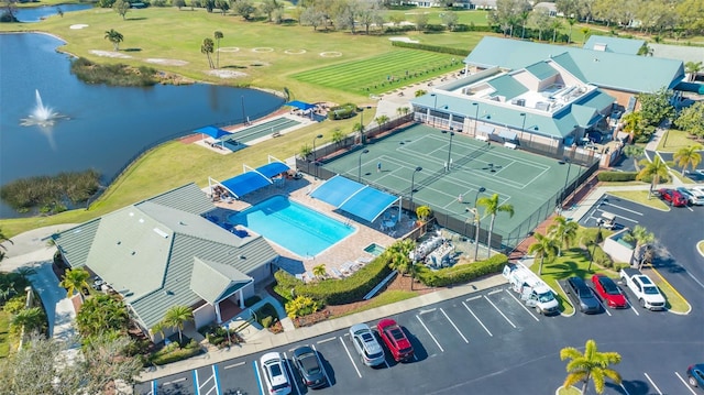 drone / aerial view with a water view