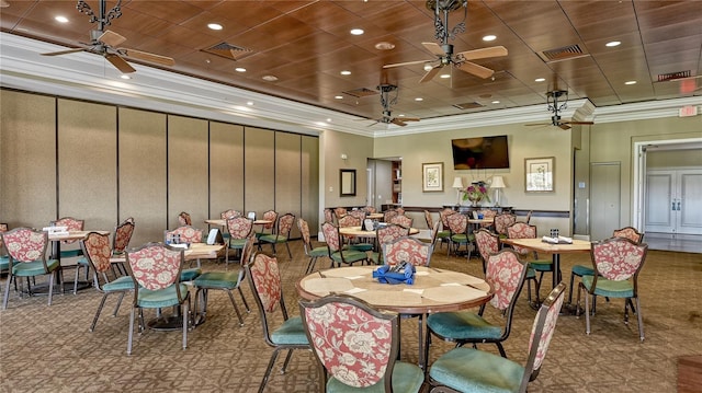 dining room featuring ornamental molding and ceiling fan