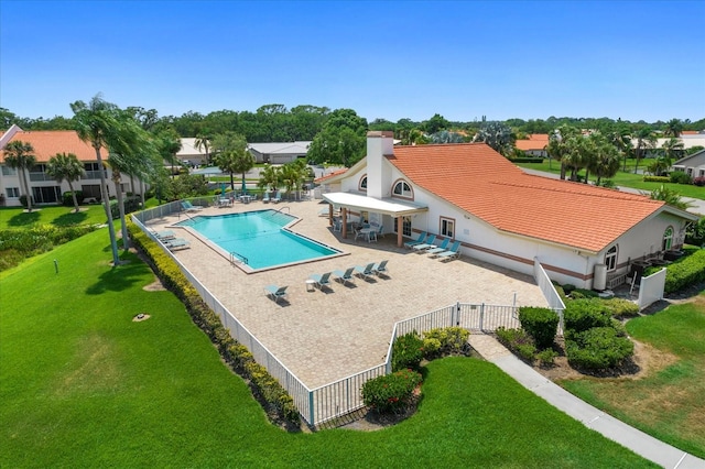 view of swimming pool featuring a patio area, a yard, and a gazebo