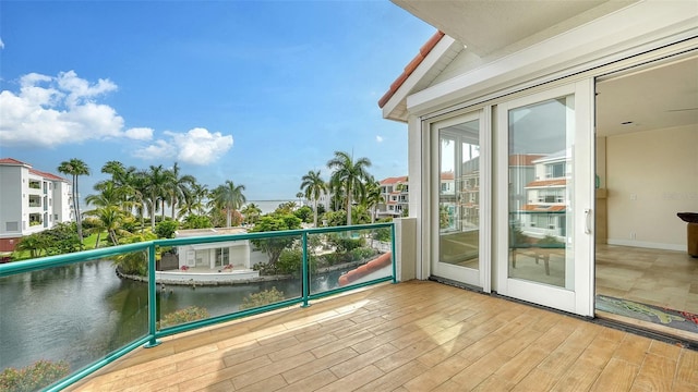 balcony featuring a water view