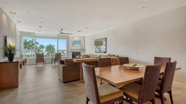 dining space with ceiling fan