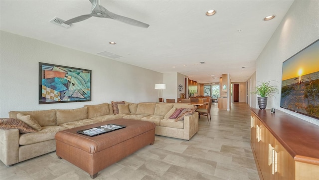 living room with ceiling fan