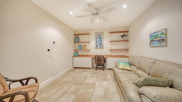 living room with ceiling fan