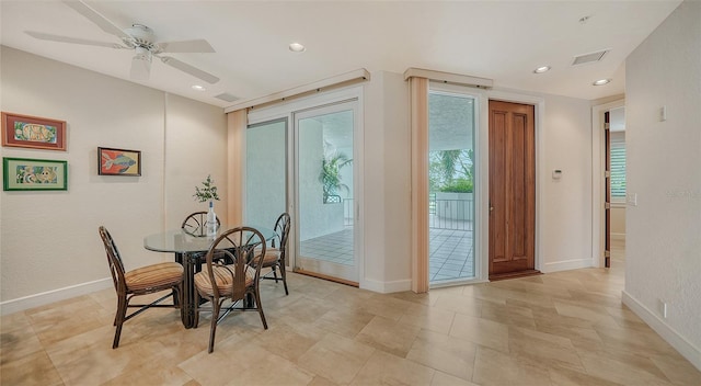 dining area with ceiling fan