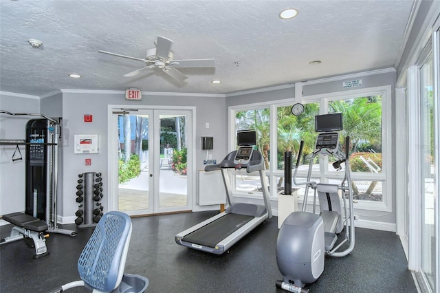 gym featuring ceiling fan, a textured ceiling, a wealth of natural light, and french doors