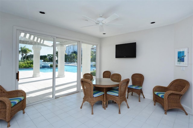 dining space featuring ceiling fan