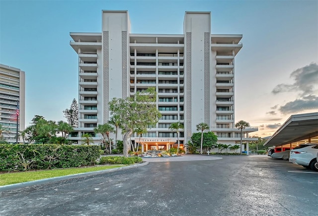 view of outdoor building at dusk