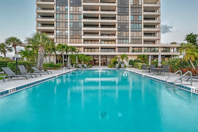 view of swimming pool featuring a patio