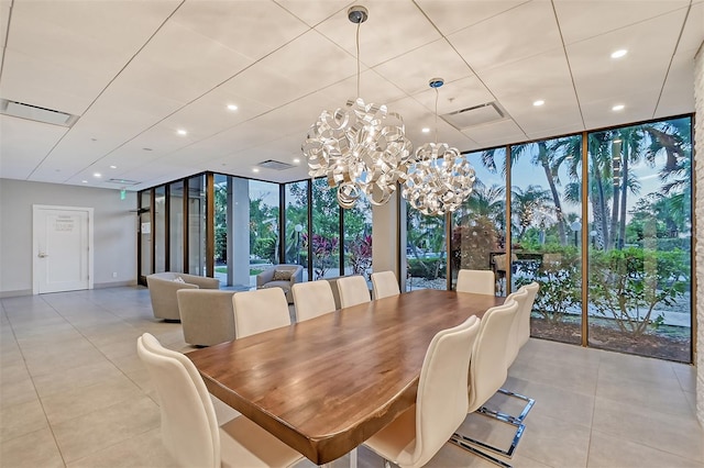 dining room featuring plenty of natural light and expansive windows