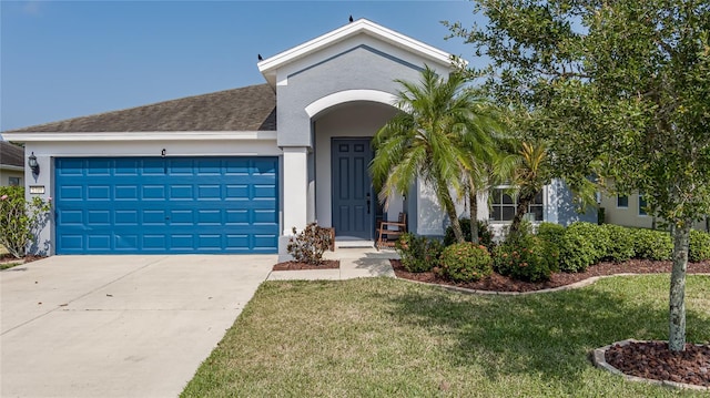 ranch-style house with a front lawn and a garage