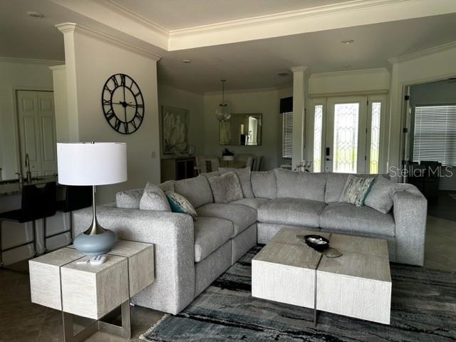 living room with crown molding