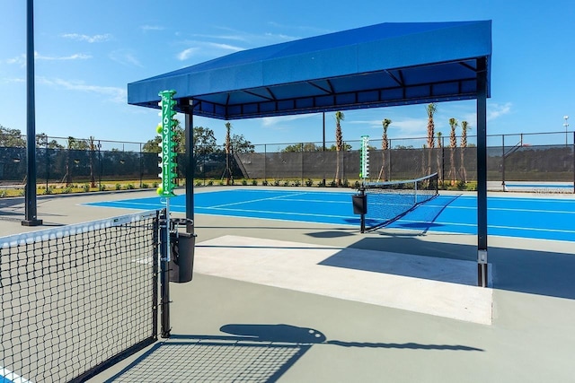 view of sport court with tennis court