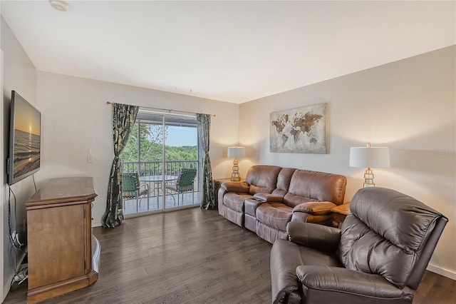 living room featuring dark hardwood / wood-style floors