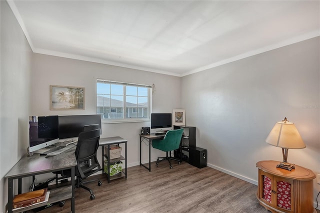 office space with crown molding and hardwood / wood-style floors